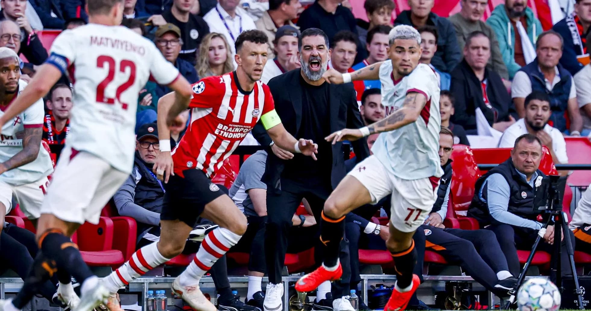 Players competing during a UEFA Champions League match