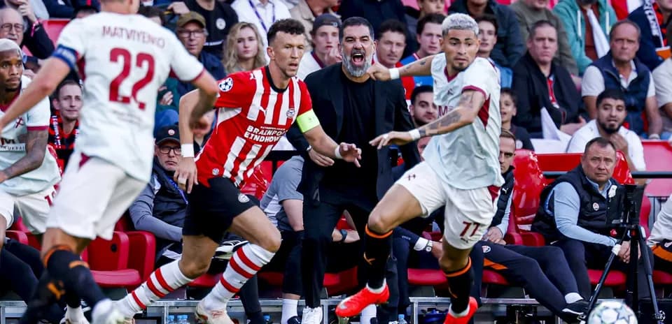 Players competing during a UEFA Champions League match