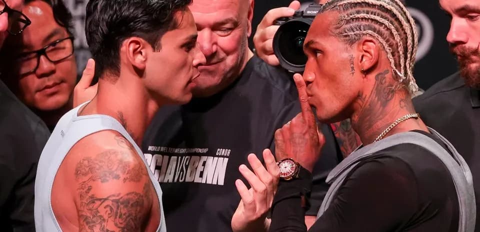 Two fighters facing off at weigh-in event
