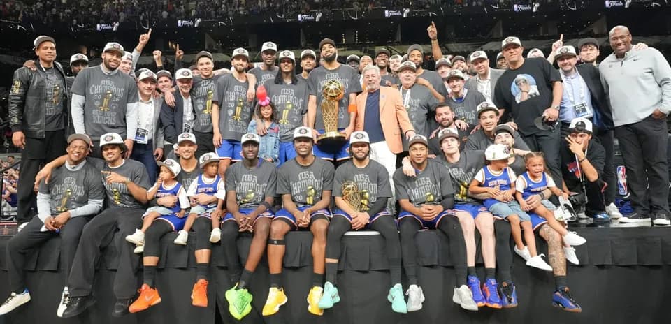 New York Knicks celebrating NBA championship with trophy