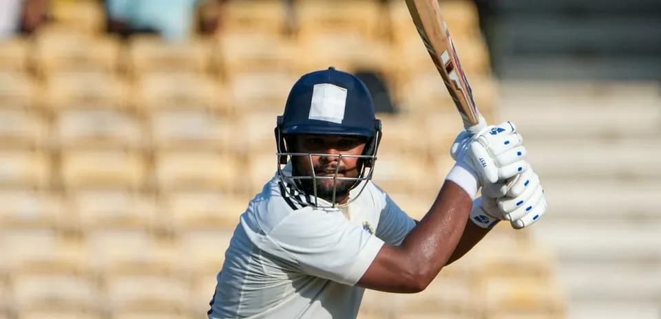 Batsman preparing to hit the ball on field