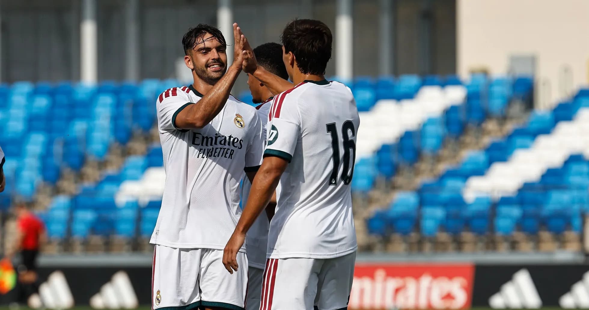 Real Madrid players celebrating a goal together