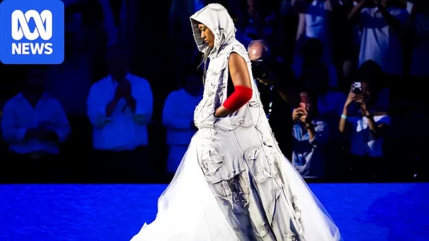 Person in unique attire walking on stage