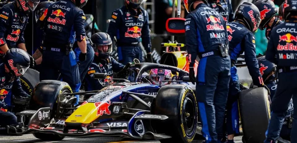 Red Bull Racing team performing a pit stop