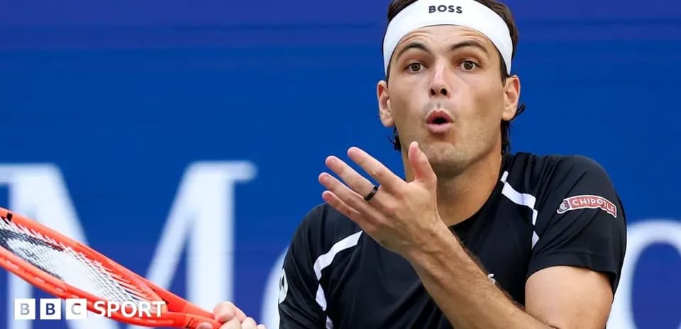 Tennis player reacting during a match