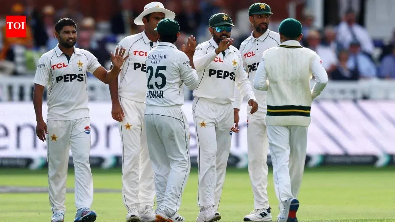 Pakistani cricket team celebrating a wicket on field