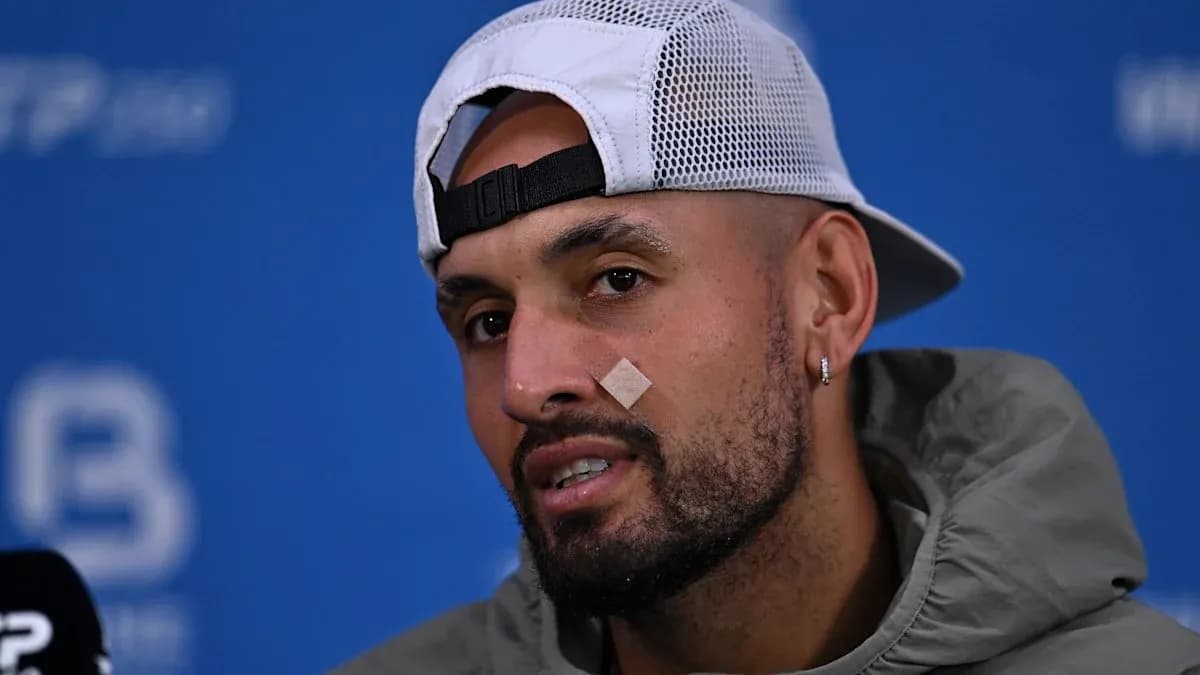 Athlete with bandage speaking at press conference
