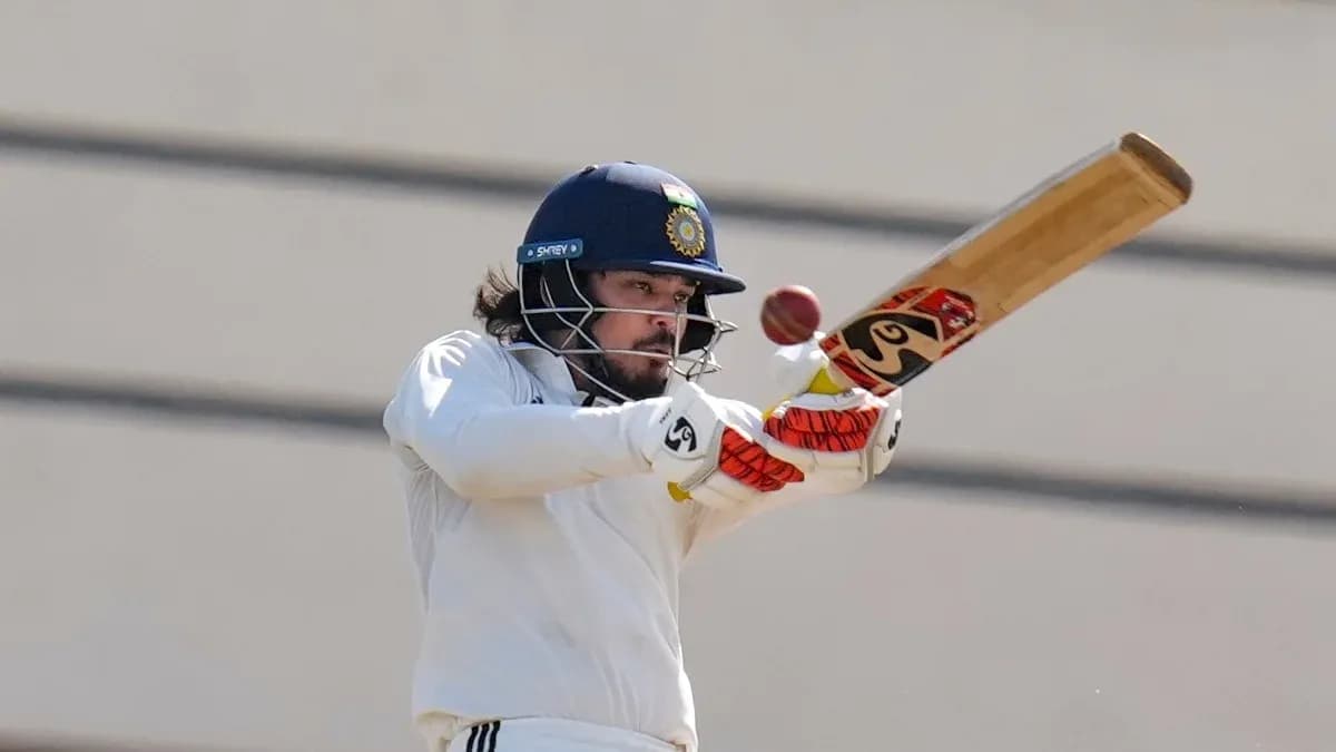 Batsman striking the ball during cricket match