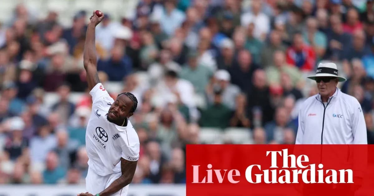 Bowler delivering a ball during cricket match