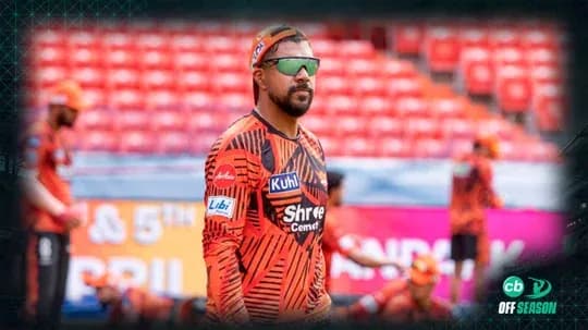 Player in orange jersey during warm-up session