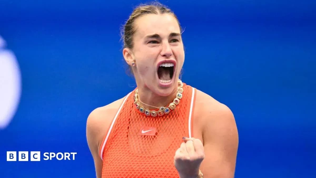Tennis player celebrating during match with clenched fist
