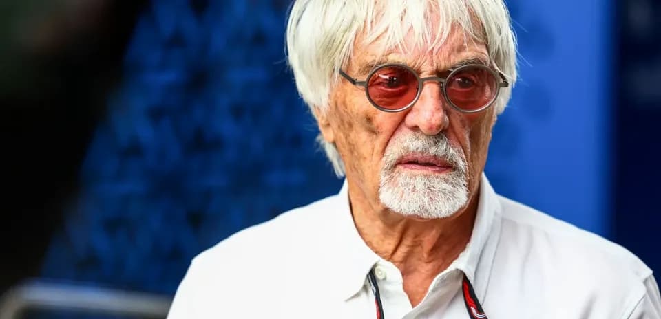 Elderly man with white hair and sunglasses