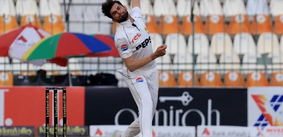 Bowler delivering a ball in cricket match