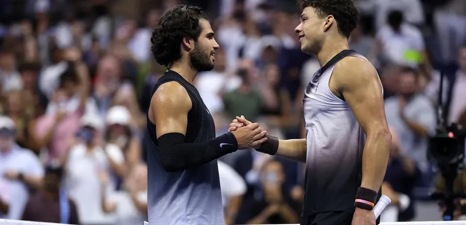 Players shaking hands after tennis match at US Open