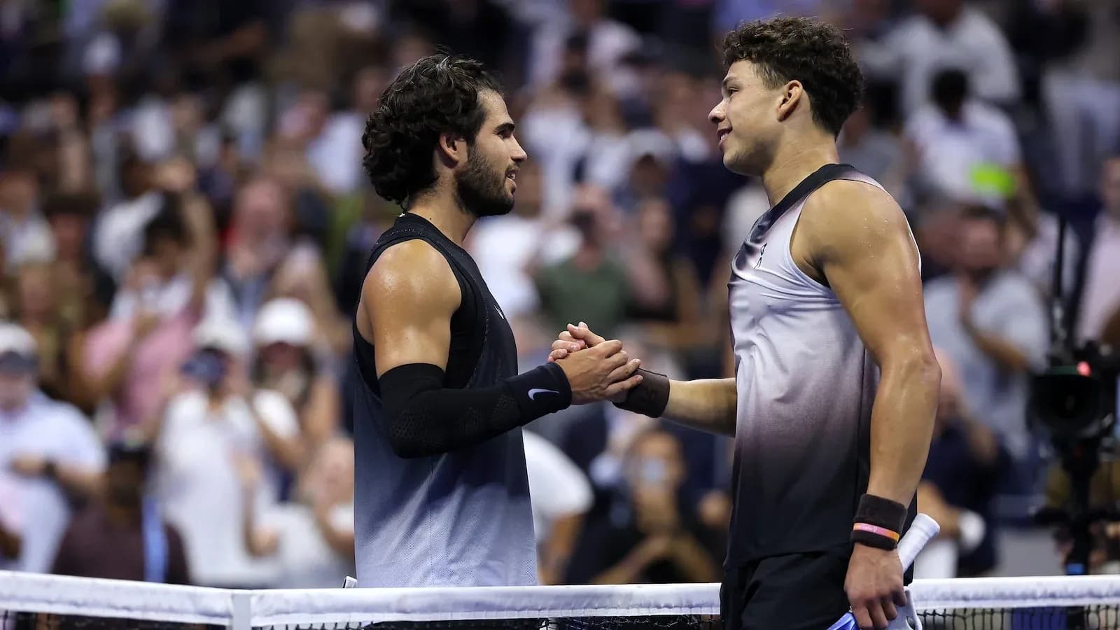 Players shaking hands after tennis match at US Open