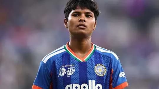 Player in blue jersey during Asia Cup match