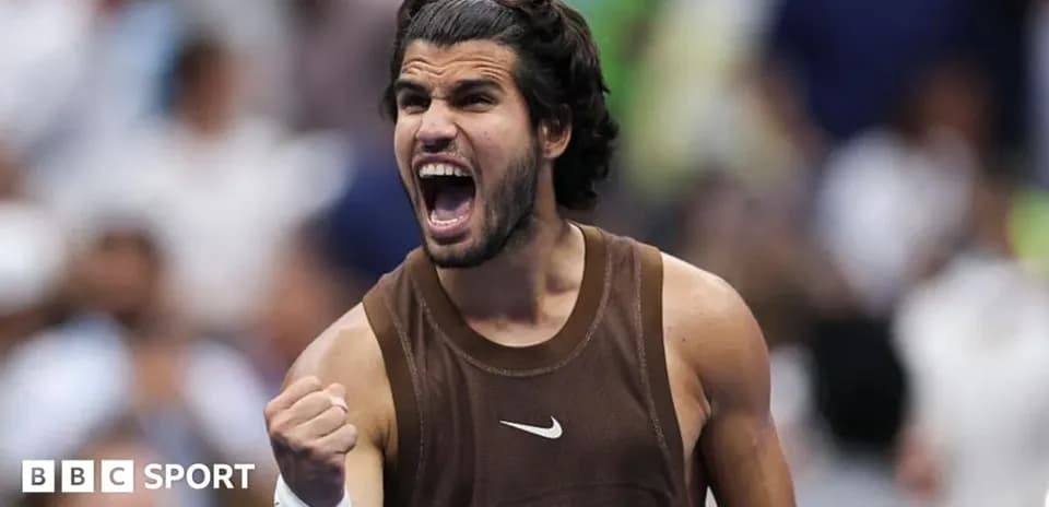 Tennis player celebrating with a fist pump