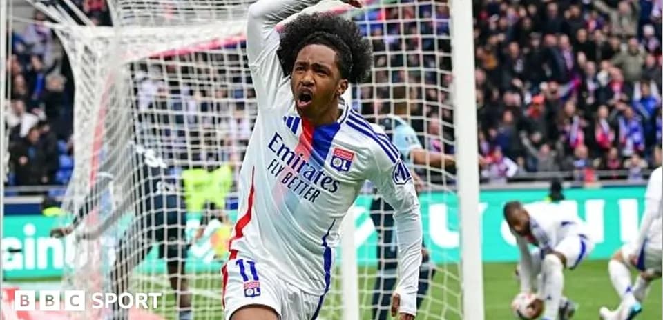 Player celebrating after scoring a goal for Lyon