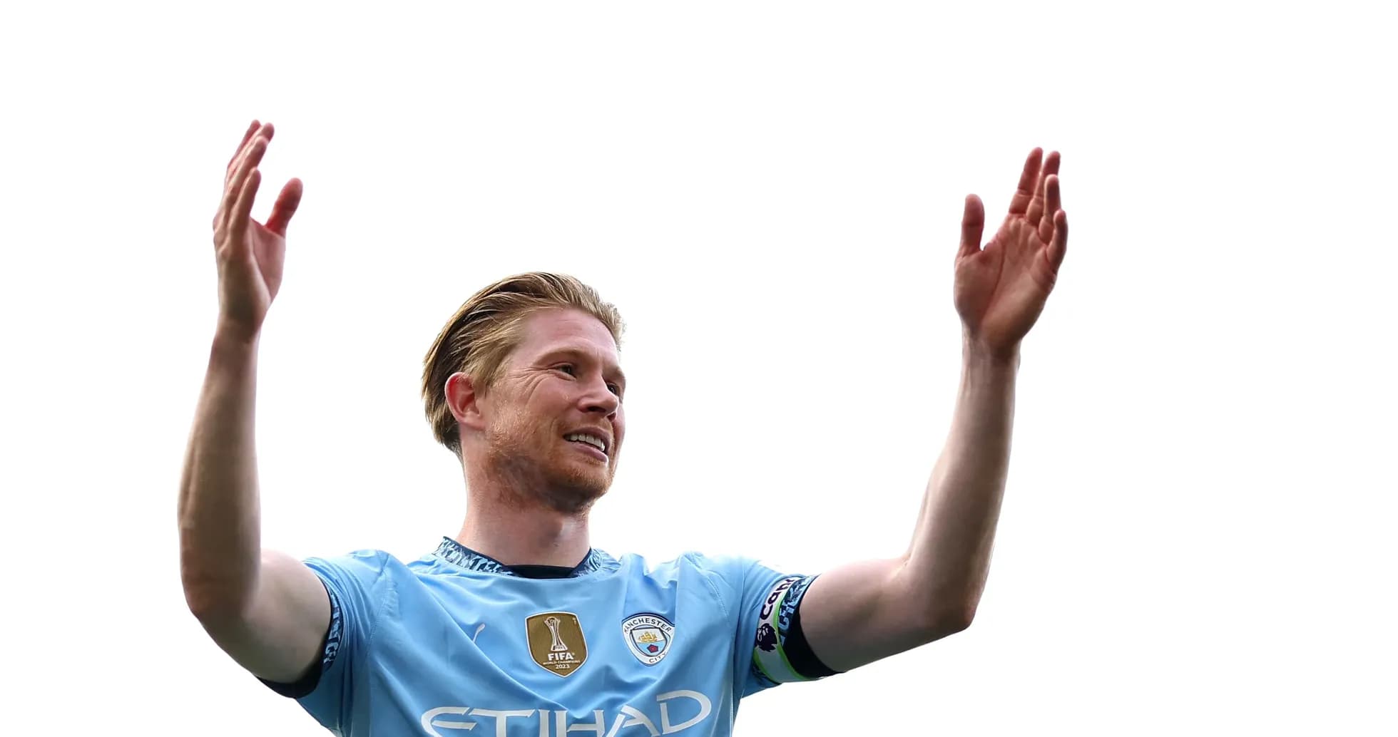 Player celebrating with arms raised during match