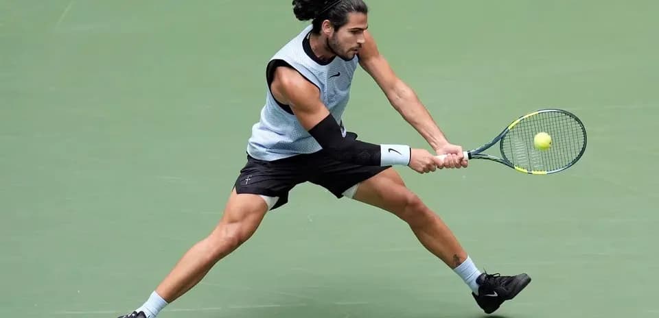 Player executing a forehand stroke on court