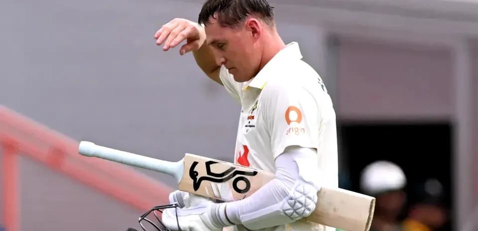 Batsman walking off field after innings during match