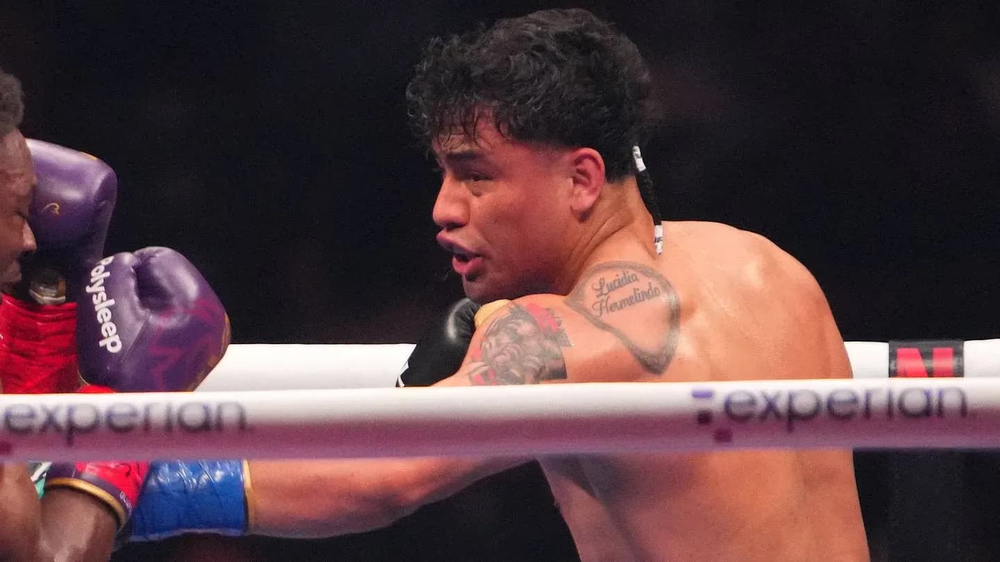 Boxer throwing a punch during a match