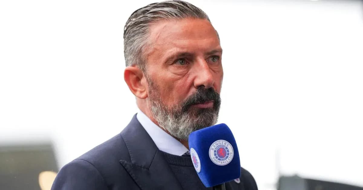 Man speaking into microphone during interview