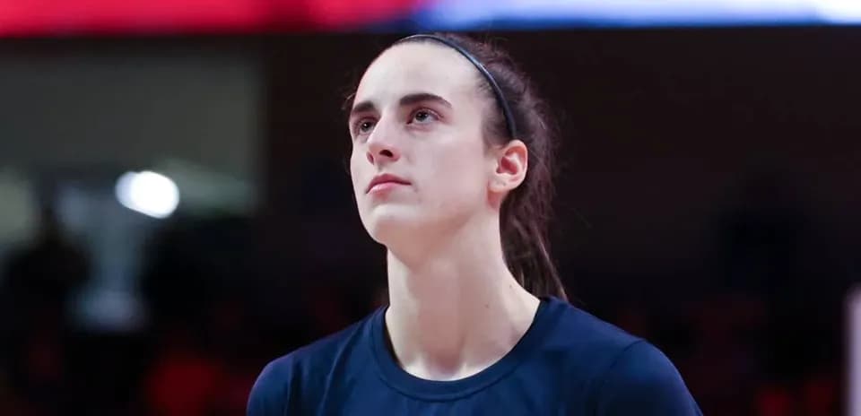 Female basketball player looking up during warm-up