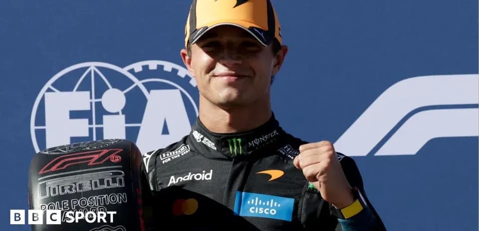 Driver celebrating with pole position tire at event