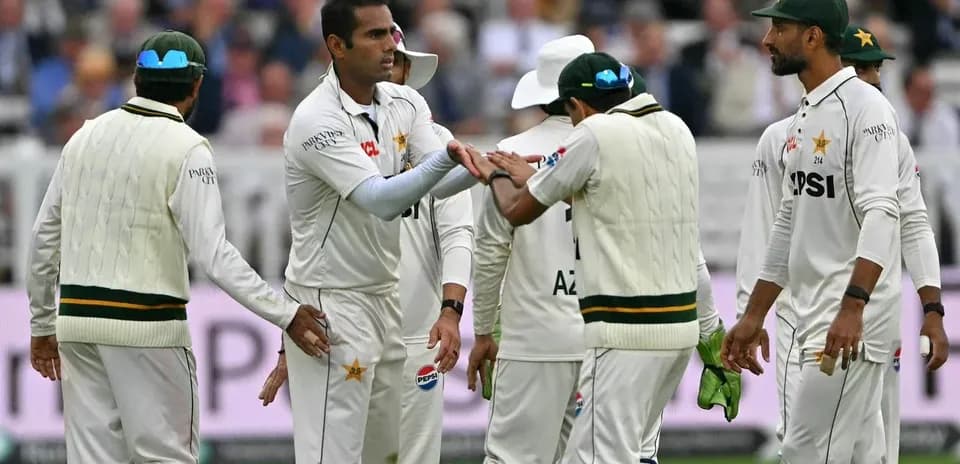 Pakistani players celebrating a wicket on field