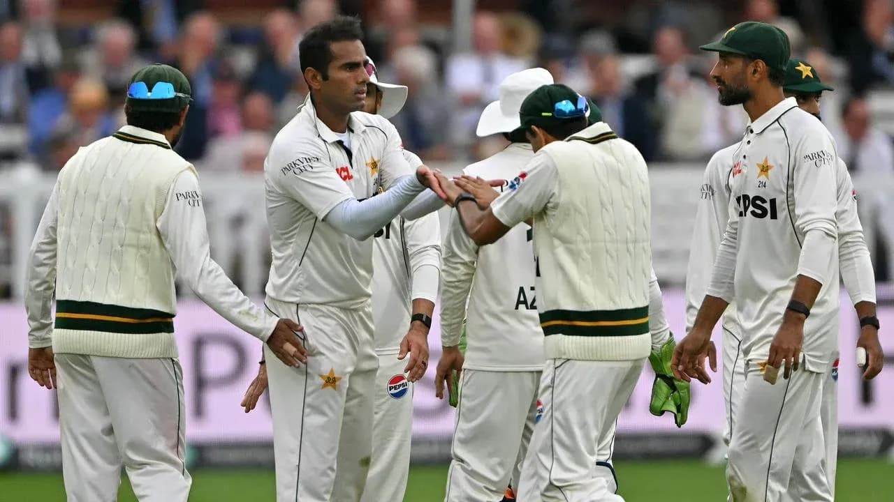 Pakistani players celebrating a wicket on field