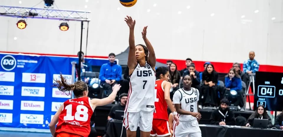 Player shooting the ball during basketball game