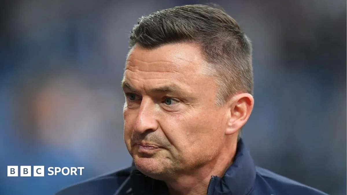 Coach looking thoughtful during a match