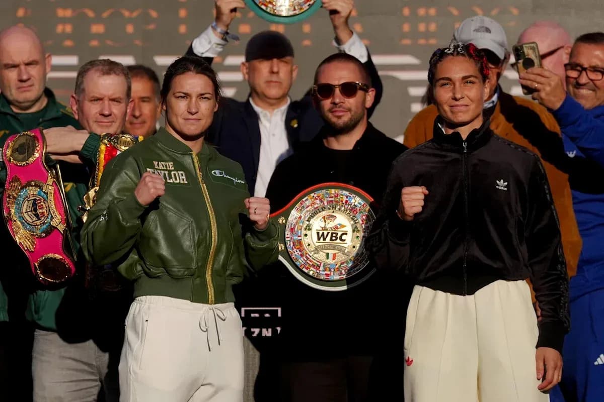 Katie Taylor and opponent posing before boxing match