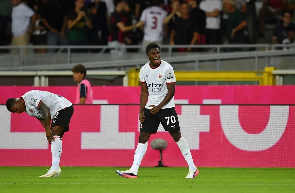 AC Milan players celebrating during a match