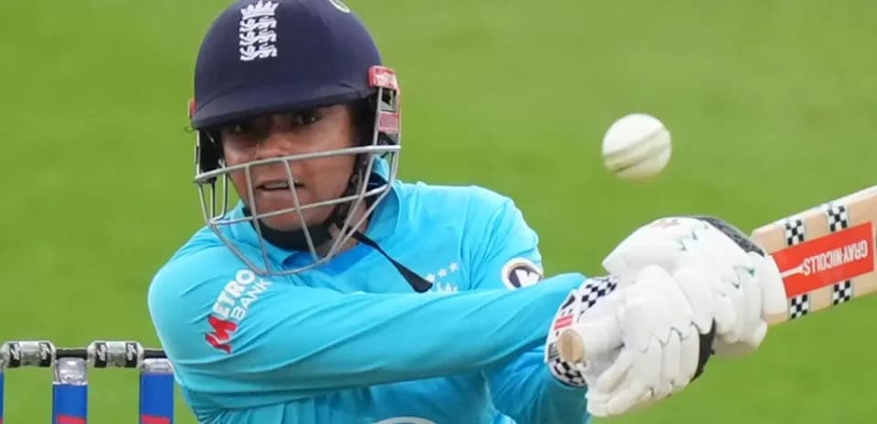 Batter hitting the ball during cricket match