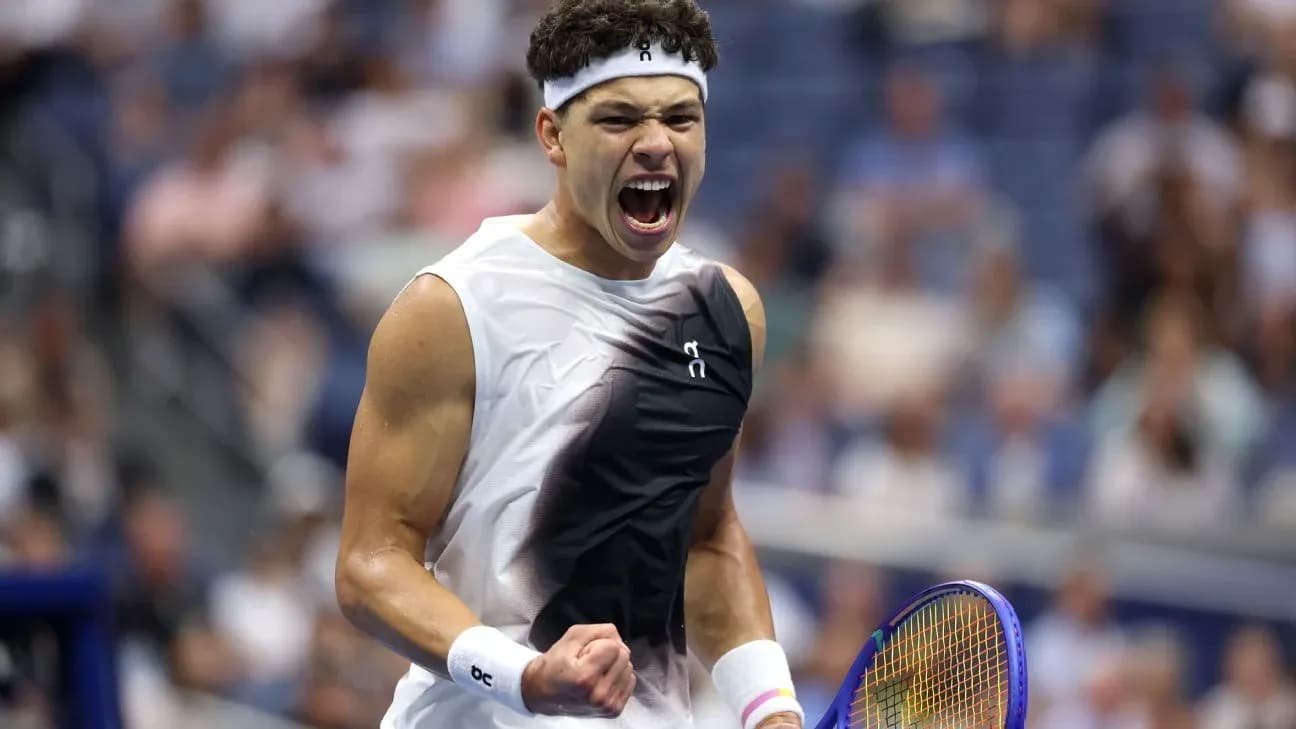 Tennis player celebrating a point during match