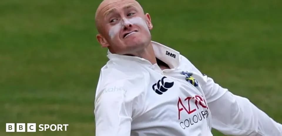 Cricketer bowling with sunscreen on face