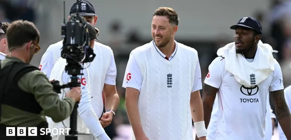 England cricket players walking off the field after match