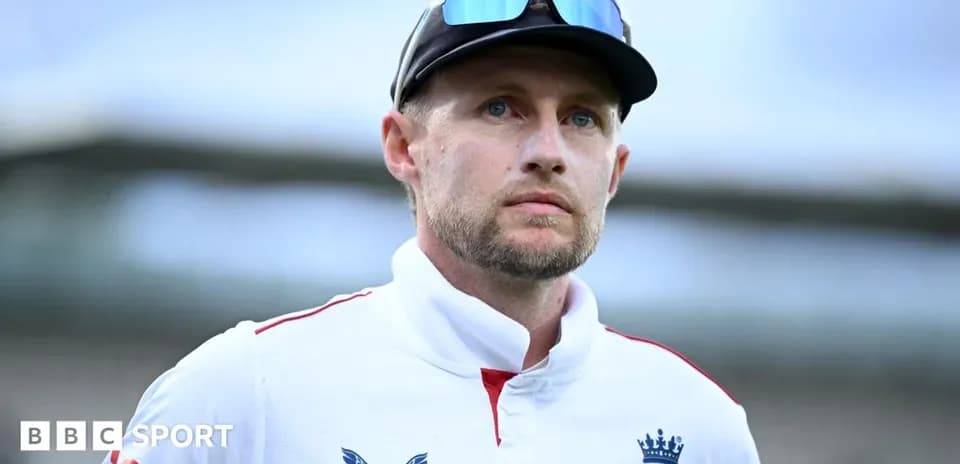 Cricketer wearing England kit at stadium