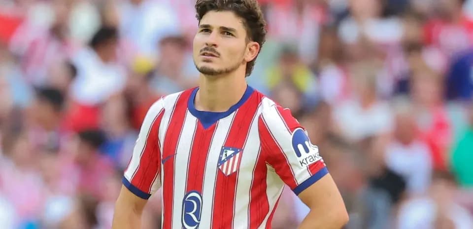 Atletico Madrid player looking up during match