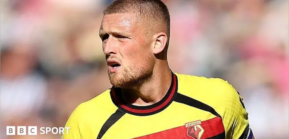 Player in Watford kit during match action