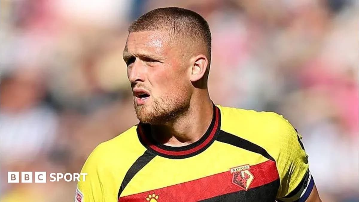 Player in Watford kit during match action