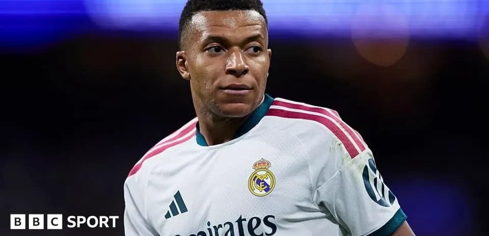 Player wearing Real Madrid kit on the field
