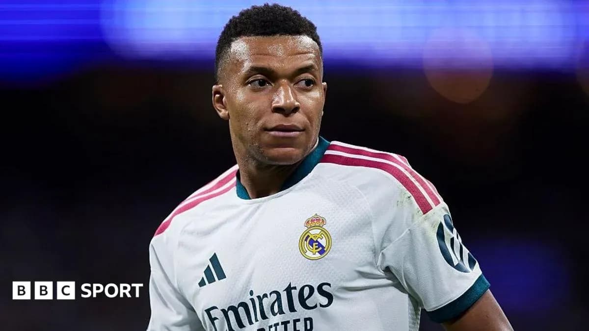 Player wearing Real Madrid kit on the field