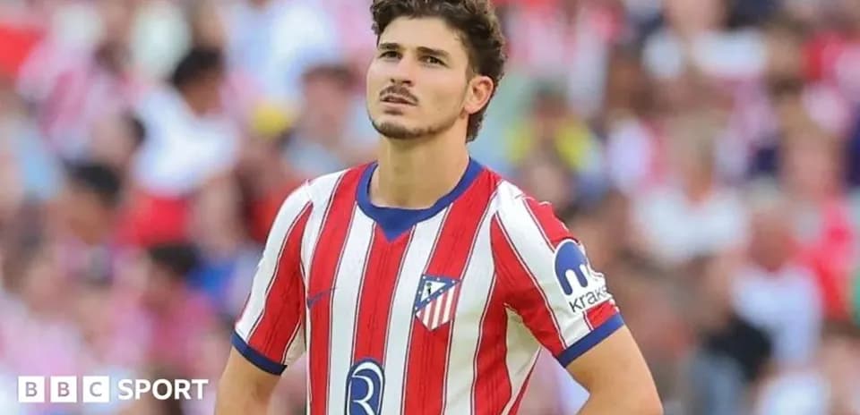 Atletico Madrid player looking concerned during match