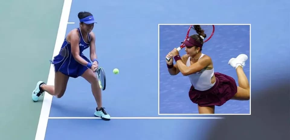 Female tennis player returning a ball during match