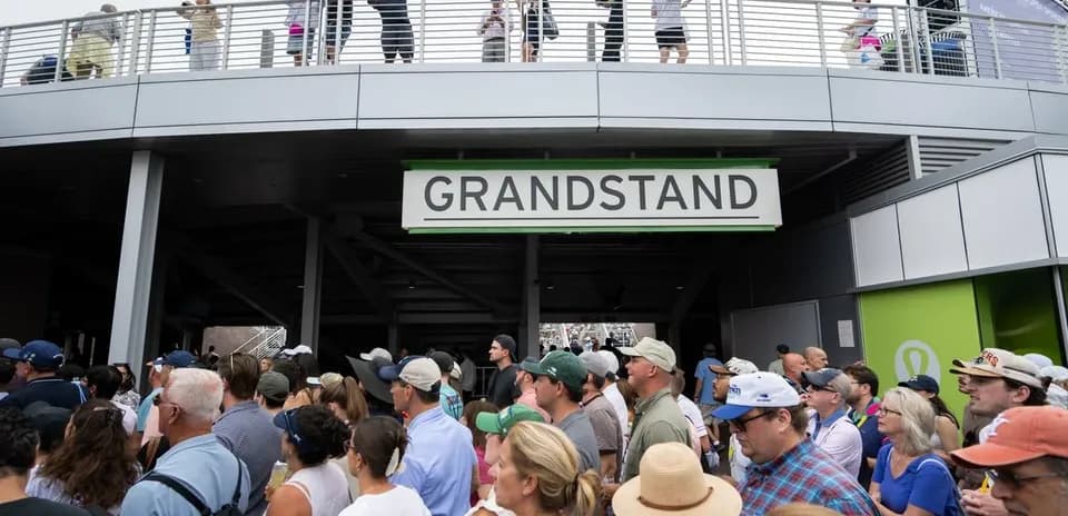 Crowd waiting to enter the grandstand area