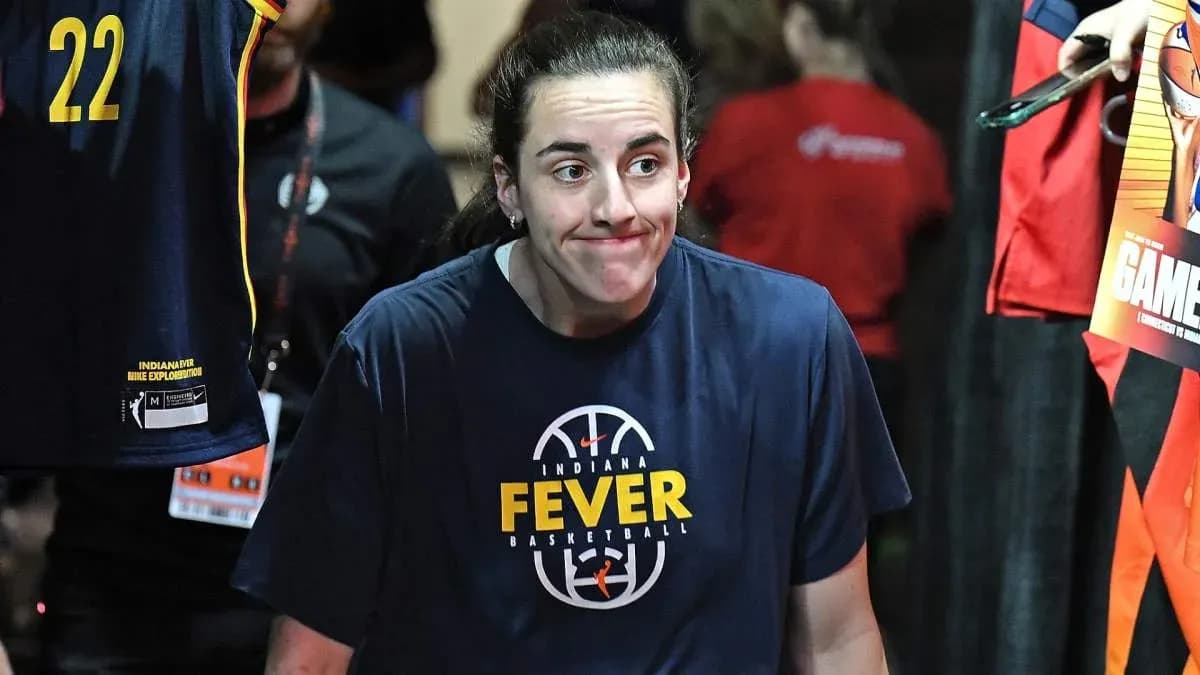 Player walking onto court wearing Indiana Fever shirt