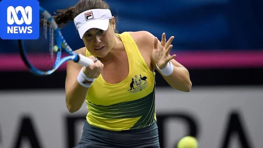 Female tennis player serving during a match